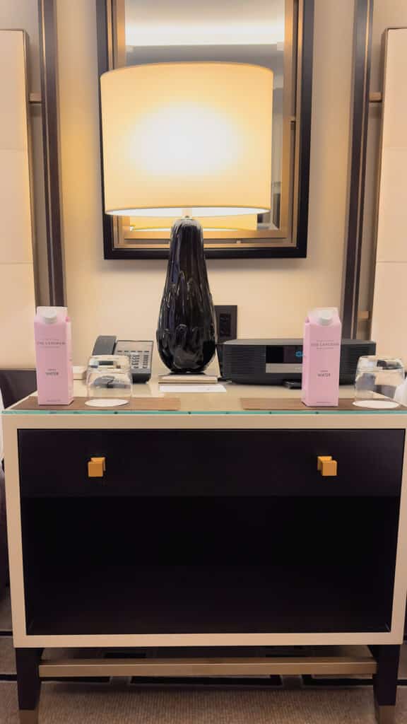 Langham Hotel Room Nightstand The Langham Water in pink tetrapaks