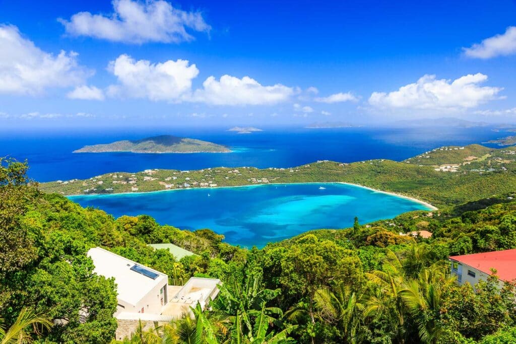 St Thomas, US Virgin Islands. A view with lush green forest and blue waters of the Magens Bay